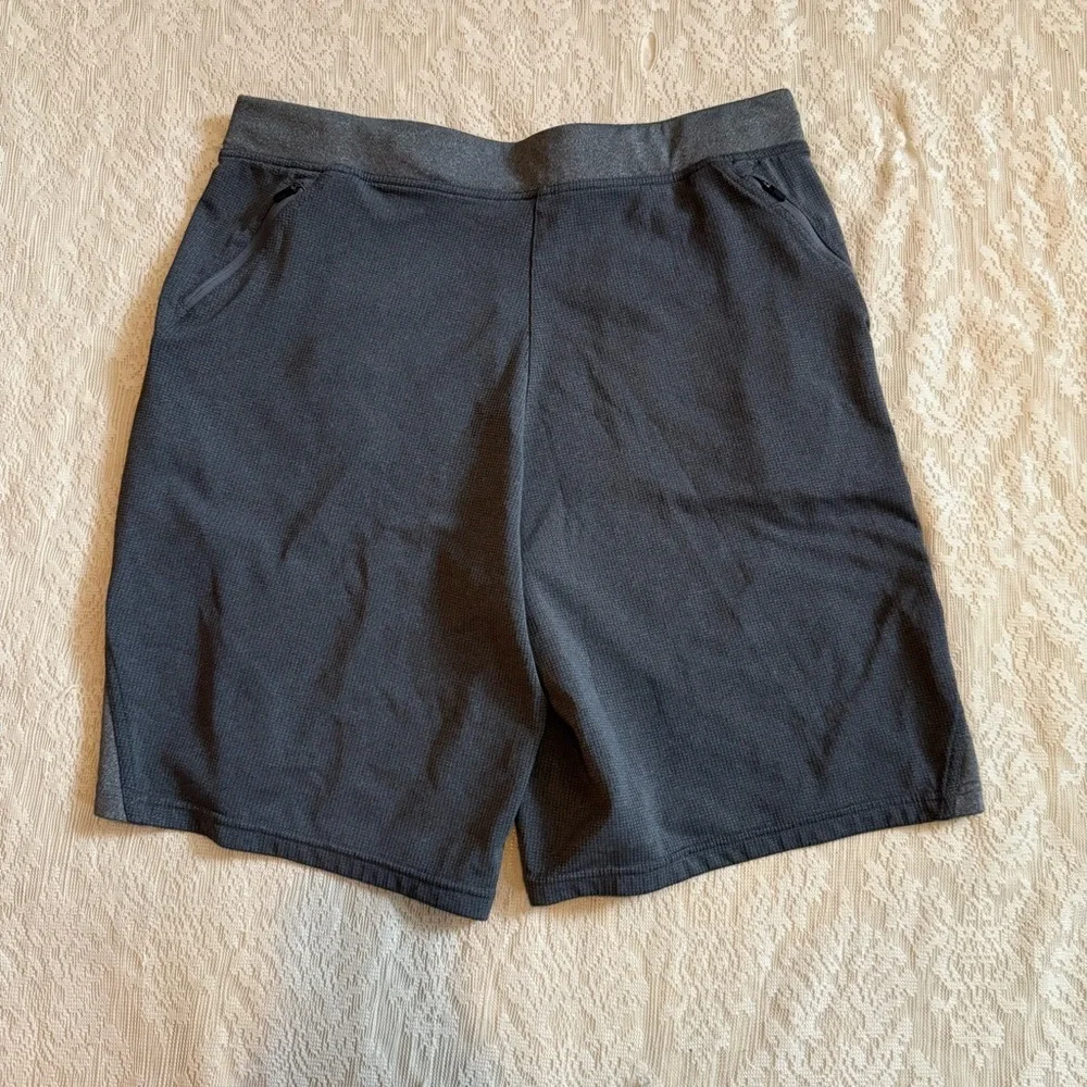 Hylete above knee drawstring zipper pocket athletic shorts
